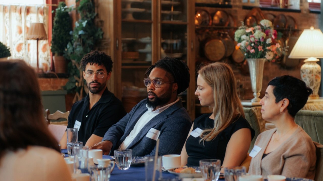 Kason Morris in a roundtable discussion with executives and practitioners.