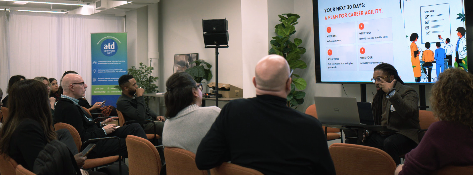 Kason Morris in conversation with an audience at an ATD New York City session, presenting a slide titled “Your Next 30 Days: A Plan for Career Agility.”
